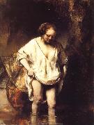 REMBRANDT Harmenszoon van Rijn, A Woman Bathing in a Stream